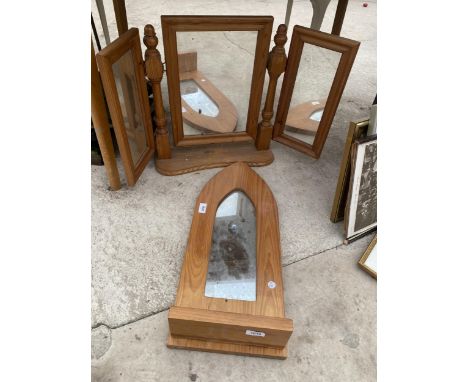 A PINE FRAMED WALL MIRROR WITH LOWER SHELF AND A FURTHER PINE FRAMED SWING DRESSING TABLE MIRROR 