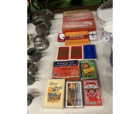 A QUANTITY OF VINTAGE PLAYING CARDS AND DOMINOES 