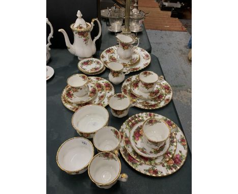 A ROYAL ALBERT 'OLD COUNTRY ROSES' COFFEE/TEASET TO INCLUDE A COFFEE POT, CREAM JUGS, SUGAR BOWLS, CAKE PLATE, CUPS, SAUCERS,