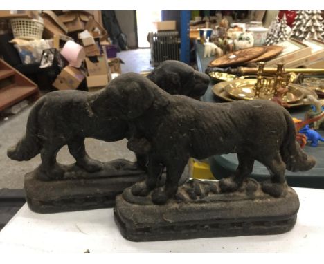 A PAIR OF VINTAGE CAST DOG DOOR STOPS 