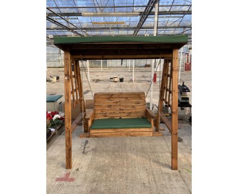 AN AS NEW EX DISPLAY CHARLES TAYLOR SWING SEAT BENCH WITH CANOPY *PLEASE NOTE VAT TO BE CHARGED ON THIS ITEM* 