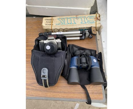 A SLIK CAMERA TRIPOD, A PAIR OF BINOCULARS AND A PENTAX MZ-50 CAMERA 