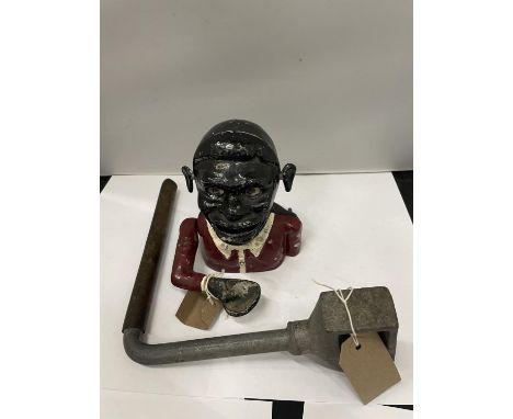 A VINTAGE 'JOLLY MAN' MONEY BANK PLUS A POSSIBLE LOCK GATE KEY 