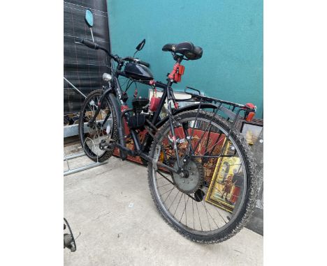 A ROCKRIDER PUSH BIKE WITH MOTORISED ENGINE 