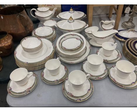 A ROYAL DOULTON 'ORCHARD HILL' SECONDS DINNER SERVICE TO INCLUDE VARIOUS SIZES OF PLATES, LIDDED TUREENS, A SAUCE BOAT WITH S