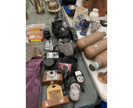 A QUANTITY OF CAMERAS AND ACCESSORIES TO INCLUDE A CANON AE-1 IN CASE, AN AGFA SUPER SILETTE, CANON POWER SHOT, SANYO VIDEO C