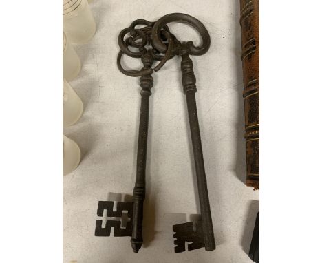TWO VERY LARGE VINTAGE CAST KEYS ON A RING 