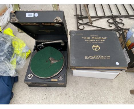 A COLUMBIA RECORD PLAYER AND AN ASSORTMENT OF LP RECORDS 