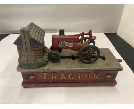 A VINTAGE STYLE CAST TRACTOR MONEY BANK 
