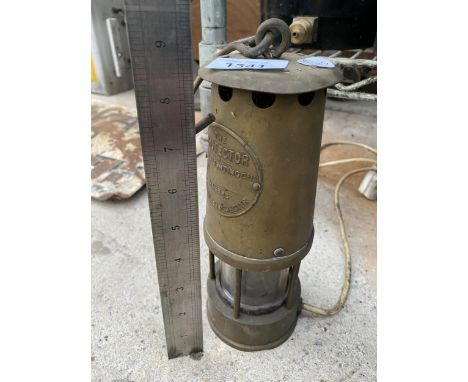 A VINTAGE PARAFIN LAMP 