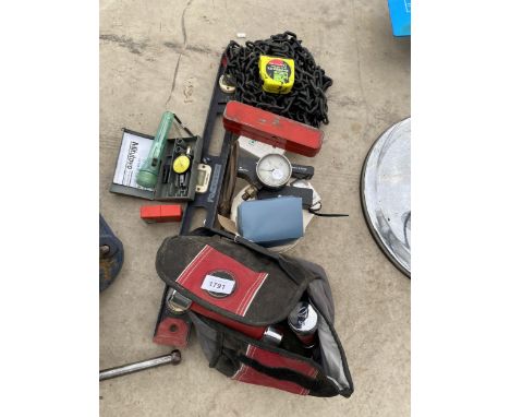 AN ASSORTMENT OF TOOLS AND HARDWARE TO INCLUDE A SPIRIT LEVEL, GUAGES AND WEIGHTD ETC 