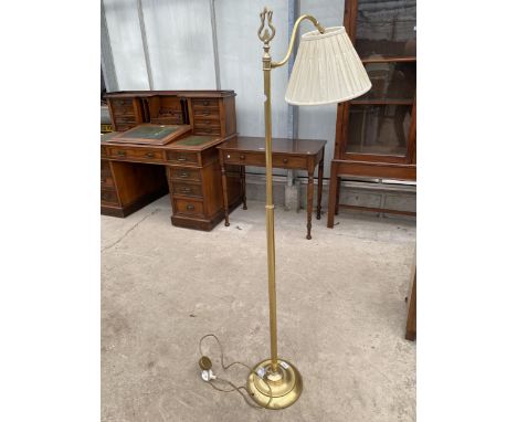 A BRASS READING STANDARD LAMP 