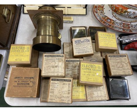 A VOIGTLANDER PETZVAL PLATE CAMERA LENS, NO. 31730 TOGETHER WITH A COLLECTION OF PLATES &amp; SLIDES IN BOXES 