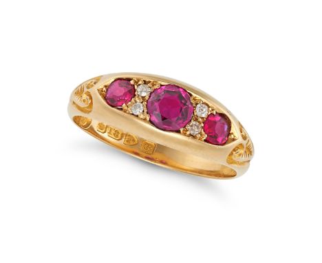 AN ANTIQUE RUBY AND DIAMOND RING in 18ct yellow gold, set with three round cut rubies accented by pairs of old cut diamonds,&