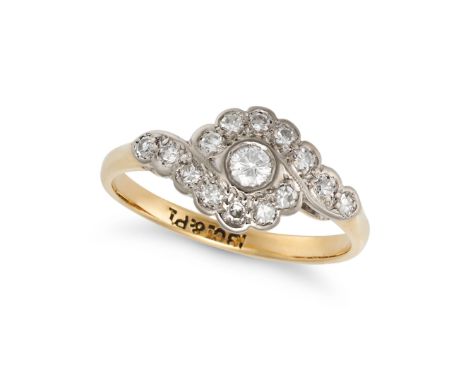 A DIAMOND RING in 18ct yellow gold and platinum, set with a round brilliant cut diamond, accented by single cut diamonds,&nbs