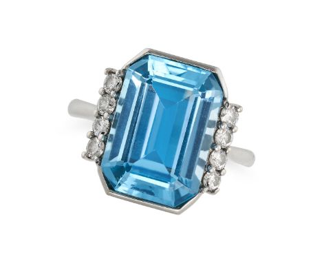 A BLUE TOPAZ AND DIAMOND RING in 18ct white gold, set with an octagonal step cut blue topaz of approximately 7.87 carats, acc
