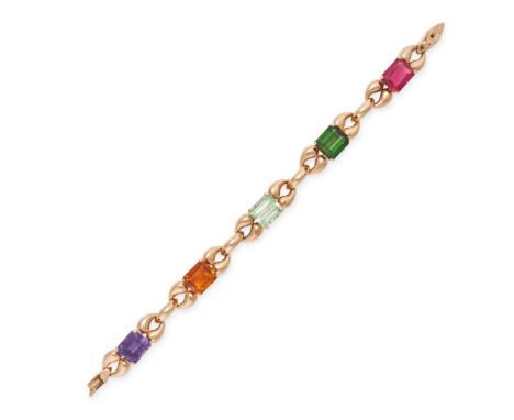 A VINTAGE GEMSET BRACELET in yellow gold, comprising a row stylised links set with an octagonal step cut amethyst, citrine, a
