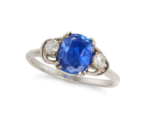 A BURMA NO HEAT SAPPHIRE AND DIAMOND THREE STONE RING set with a cushion cut sapphire of 1.50 carats between an old European 