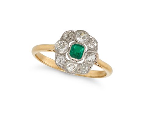 AN EMERALD AND DIAMOND RING in 18ct yellow gold and platinum, set with an octagonal step cut emerald of approximately 0.26 ca