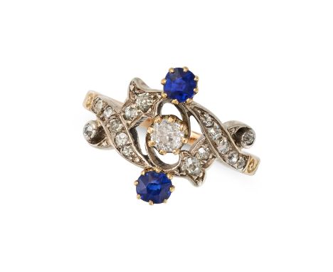 AN ANTIQUE SAPPHIRE AND DIAMOND DRESS RING in 18ct yellow gold, in scrolling design, set with an old cut diamond and round cu