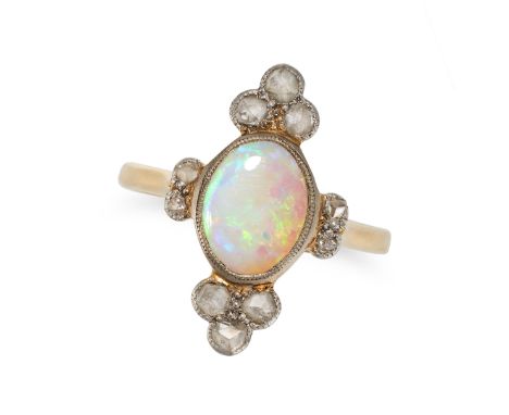 AN ANTIQUE OPAL AND DIAMOND RING in yellow gold, set with an oval cabochon opal, accented by rose cut diamonds, no assay mark