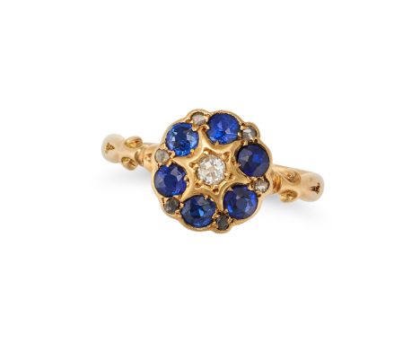 AN ANTIQUE SAPPHIRE AND DIAMOND CLUSTER RING in 18ct yellow gold, set with an old cut diamond in a cluster of round cut sapph