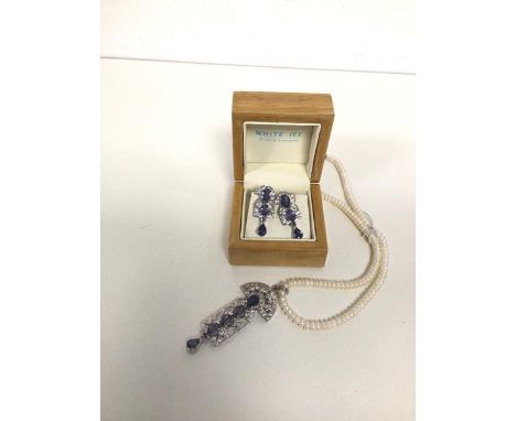 A pearl necklace with silver pendant with tanzanite and paste stones, with matching earrings, marked 925 (27cm)