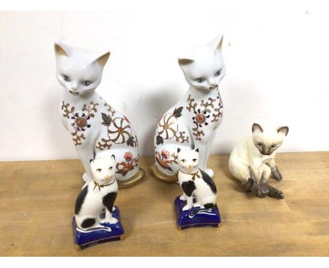 A mixed lot of cat figures including two John Jenkins (21cm), a Royal Worcester Siamese and two 19thc Staffordshire cats (5)
