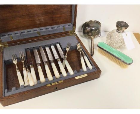 A mixed lot including an Edwardian cut glass scent bottle with silver and tortoiseshell top and a silver guilloche clothes br