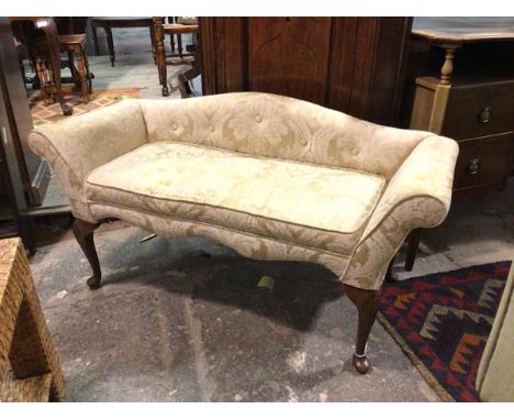 A small window seat or child's sofa, 1930s/40s, with arched back and scroll arms, in a foliate upholstery, on cabriole suppor