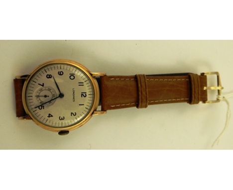 A 1950's LONGINES GENTLEMAN'S 18CT GOLD MECHANICAL WRIST WATCH having 17 jewel mechanism, faced with an Arabic dial and subsi