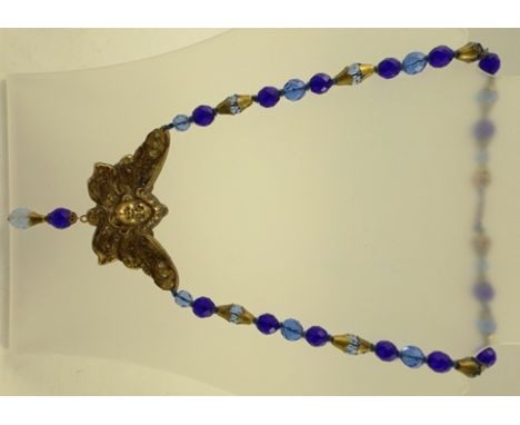 A CZECH 1930's GILT METAL ANGEL NECKLACE with facetted blue crystal beads, 44cm long 