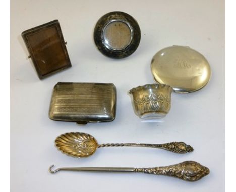 A MISCELLANY OF SILVER ITEMS comprising; powder compact, two photograph frames, cigarette case, boot hook, spoon, salt, gross