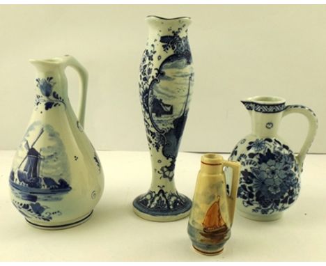 FOUR PIECES OF DELFTWARE to include a small FLAGON made for Herman Jansen Distillery, a sparrow beak JUG, a tulip shaped VASE