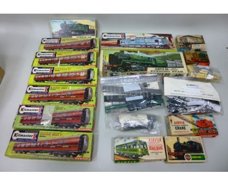 A QUANTITY OF AIRFIX & ROSEBUD KITMASTER '00' GAUGE SCALE MODEL TRAIN KITS, some part built, to include spares etc. 