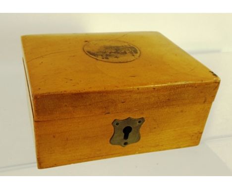 A SMALL EARLY 20TH CENTURY BEECH BOX with applied photographic print of a street scene, the whole containing a selection of g