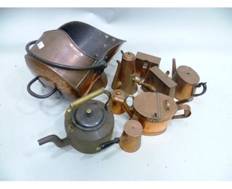 A LATE VICTORIAN COPPER HELMET SHAPED COAL SCUTTLE and a quantity of assorted copper wares 