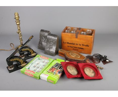 A box of mixed collectables including stamp press, bellows, oriental standard lamp, pewter bookends, Subbuteo packs etc