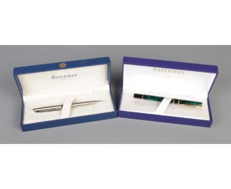 Two cased Waterman pens to include green marble effect fountain pen and silver tone rollerball example.  Rollerball is workin