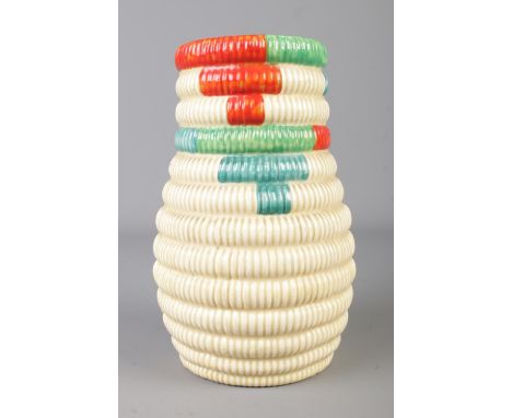 A Clarice Cliff Wilkinson Ltd Bizarre vase, Raffia 722.