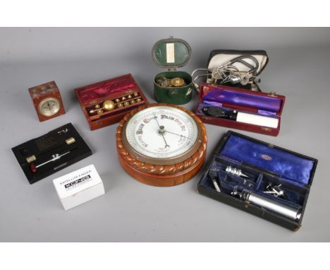 A quantity of mainly medical and scientific instruments, to include oak cased aneroid barometer, Venner time switch and Sikes
