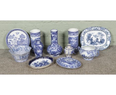A box of blue and white ceramics, to include a pair of Masons Ironstone sleeve vases, Real Old Willow plate stand, Adams octa