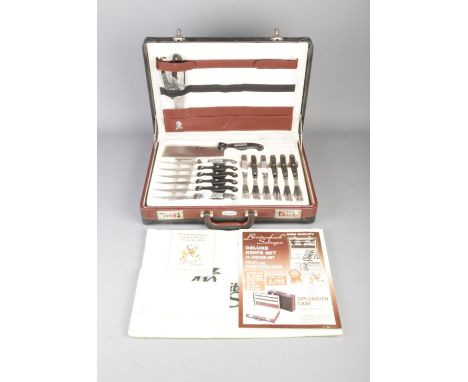 A cased Breitenbach Solingen two-tier cutlery set.