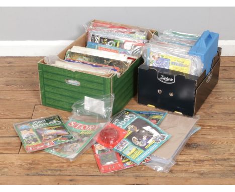 A collection of magazines including mostly Story Teller and Ultimate Real Robot.