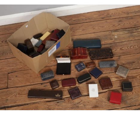 A box of assorted jewellery and watch boxes of various shapes and sizes.