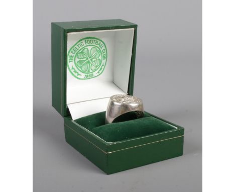 A silver signet ring, bearing Celtic Football Club logo. In branded box. Size R. Total weight: 7.3g