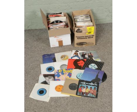 Two boxes of single records including, The Jacksons, Elvis Presley, Michael Jackson, Chuck Berry, Simply Red, Barry White, Sh