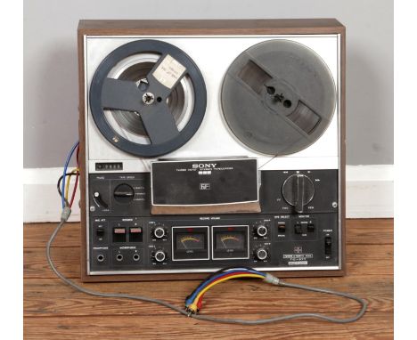 A vintage Sony TC377 stereo Reel to Reel tape recorder, comes with tap marked "War of the world's" and multicolour cables, si