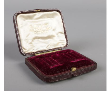 A Carlo Giuliano branded jewellery box, with hinged lid and gilt lettering to the inside. Stamped 'K' to the base.