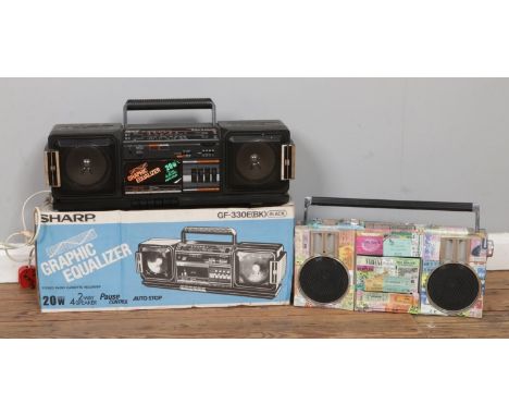 Two Vintage portable stereos: boxed Sharp GF-330E and Hitachi TRK-6800E.  Sharp powers on, Hitachi does not work.